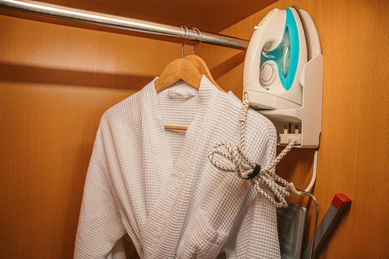 St Giles Gardens Hotel Kuala Lumpur Exteriör bild A bathrobe